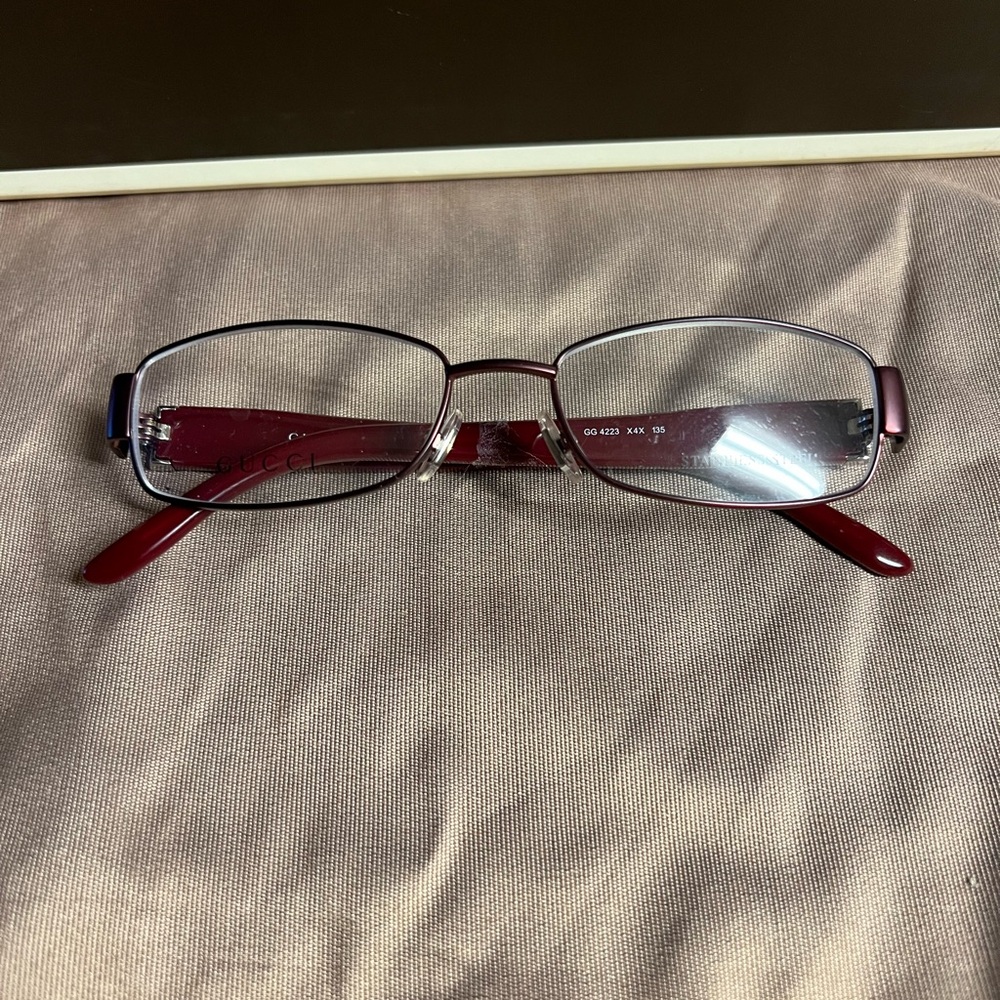 Maroon Gucci glasses